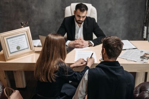 couple meeting with lawyer